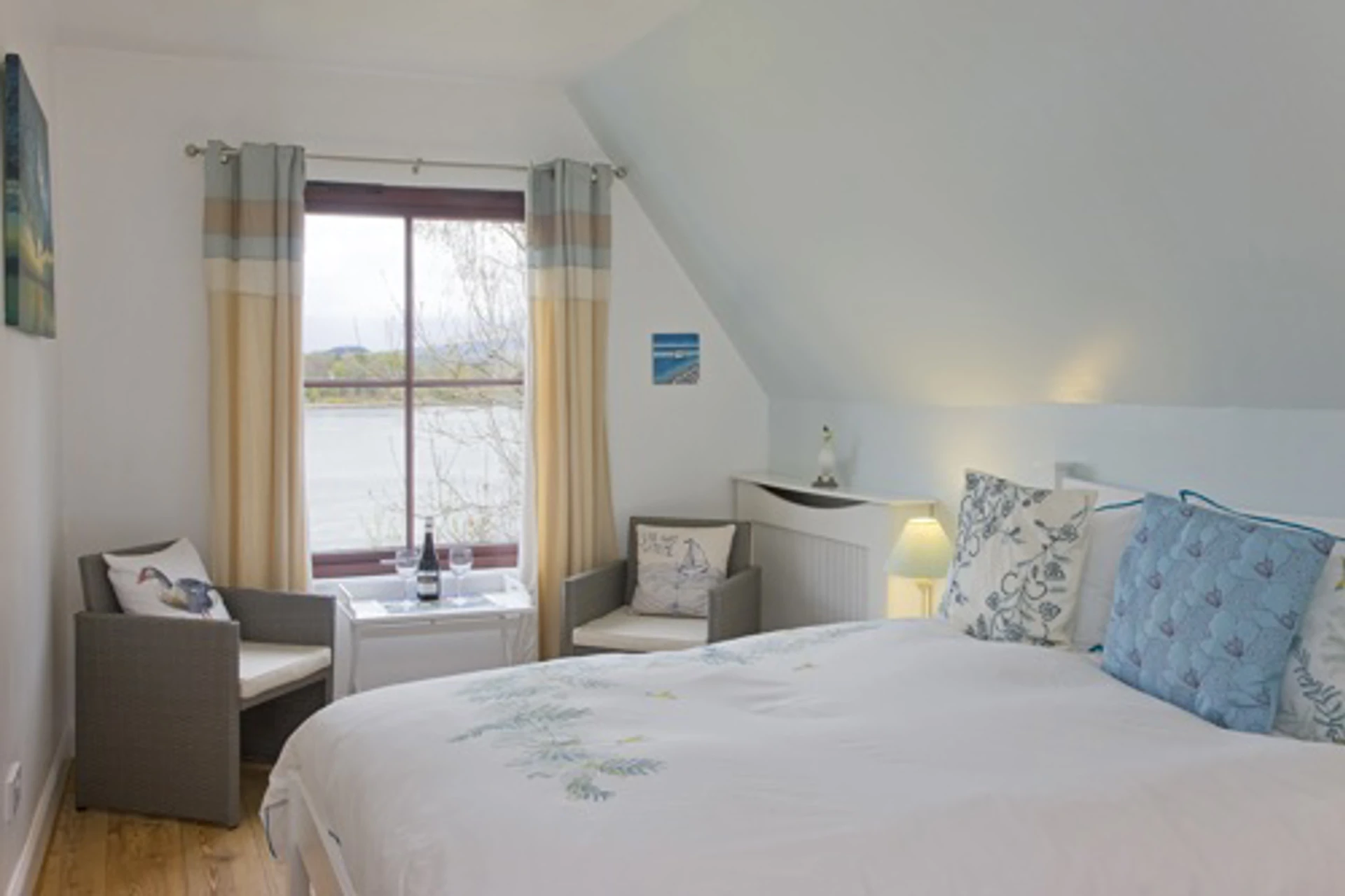 upstairs_bedroom_and_seating_area.jpg